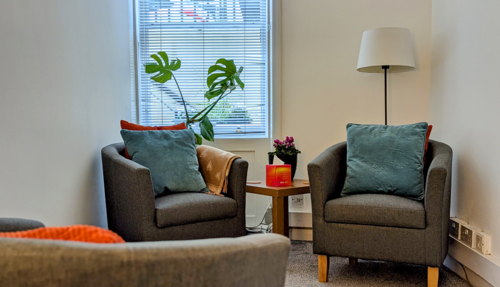 Bright therapy room rental Brighton with comfortable chairs and natural light